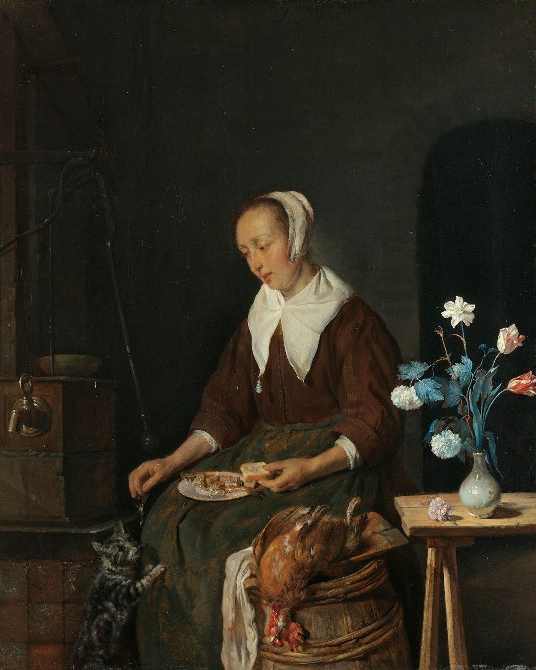 Title: Woman Eating, Known as ‘The Cat’s Breakfast’.
Date: c.1661 - c.1664.
Institution: Rijksmuseum.
Provider: Rijksmuseum.
Providing Country: Netherlands.
Public Domain
