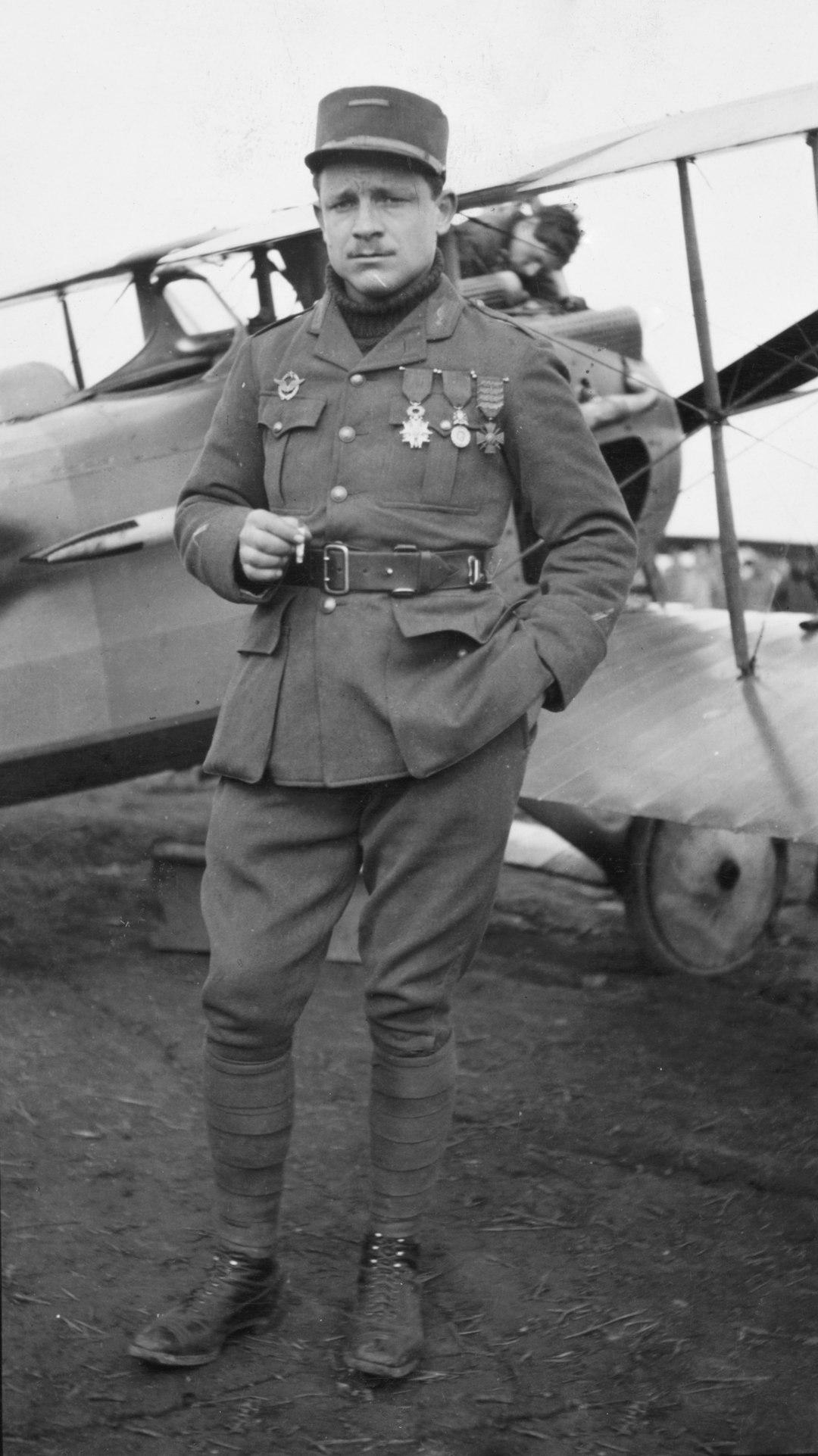 Lafayette Escadrille, Lt. Raoul Lufbury [i.e. Lufbery], World War 1914-1918, c1920. Photograph showing Lt. Raoul Lufbery, full-length portrait, standing alongside airplane, in uniform, facing slightly left. Library of Congress Prints & Photographs Division. https://www.loc.gov/item/90714838/