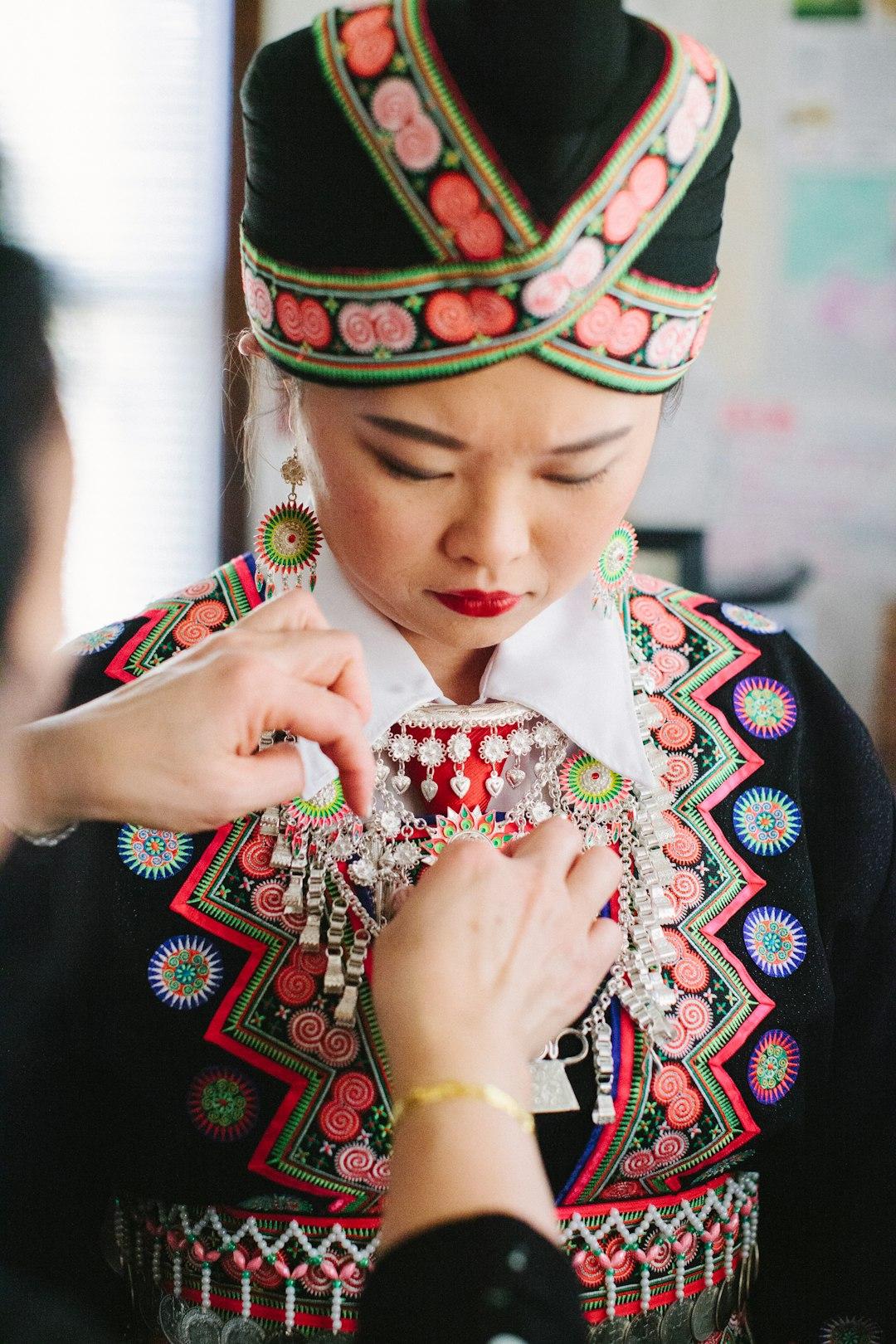 Hmong bride getting ready for the ceremony.